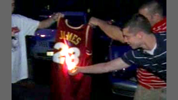 SEE IT: Cavaliers 'fan' wears burnt LeBron James jersey to game