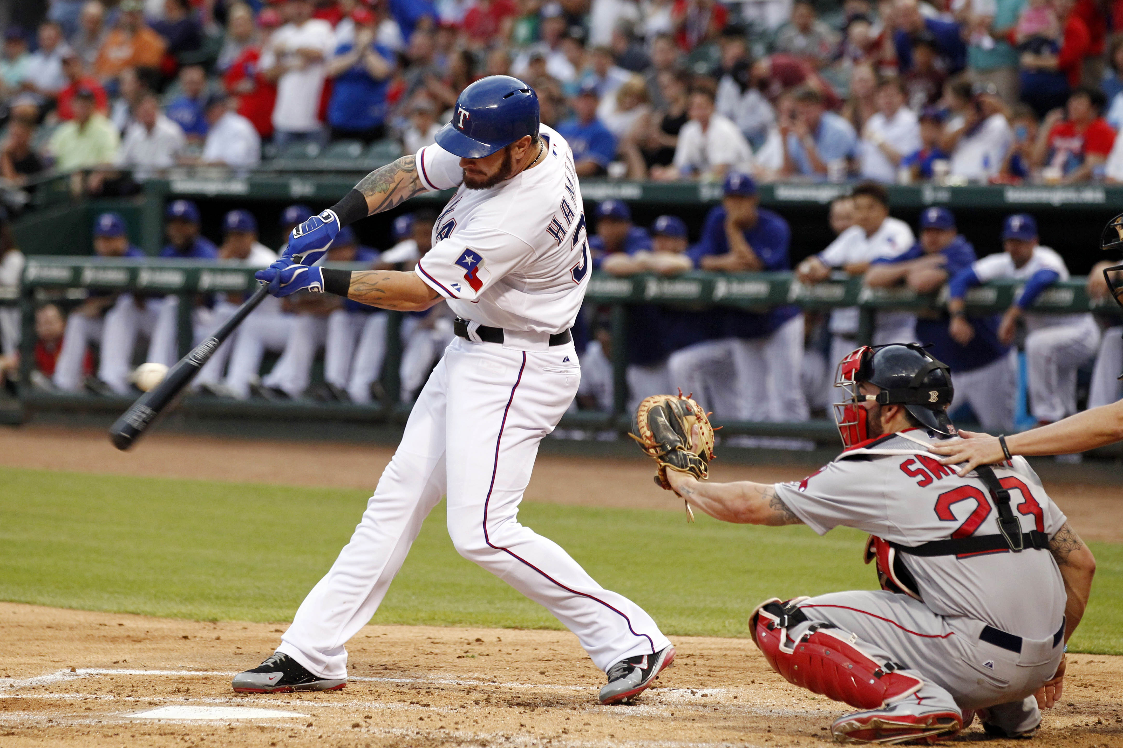 Texas Rangers' Josh Hamilton gets a single in the first inning
