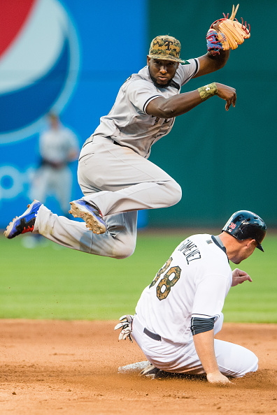 Adrian Beltre, Elvis Andrus, and Nomar Mazara by Tom Pennington