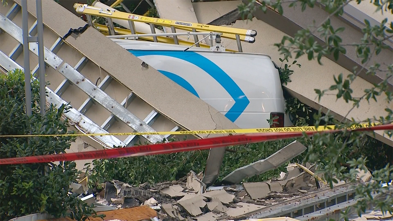 Storms bring facade of Dallas garage crumbling down | khou.com