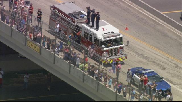 Thousands pay respects to fallen officer