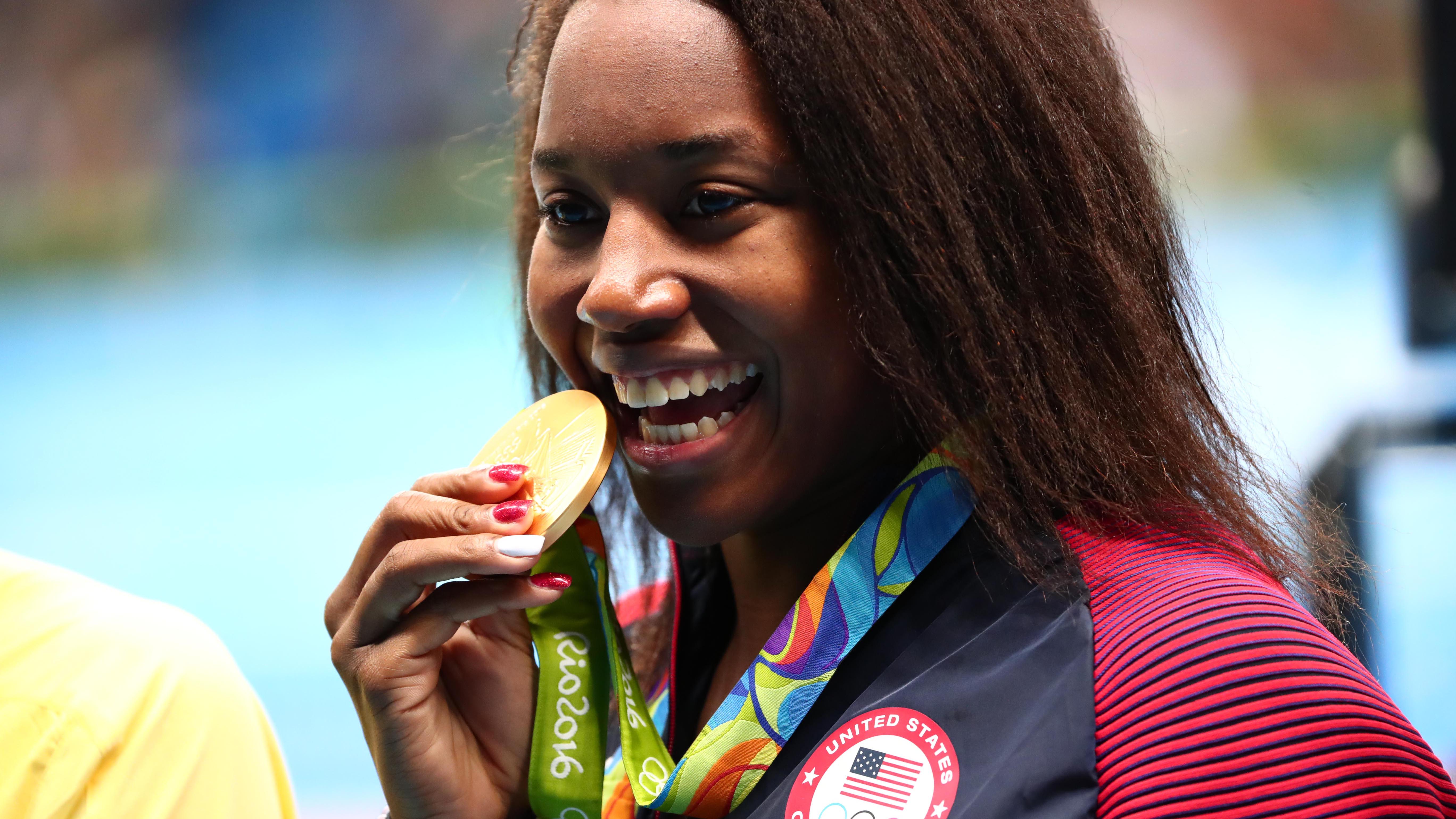 Texan Simone Manuel makes history, ties for Olympic gold