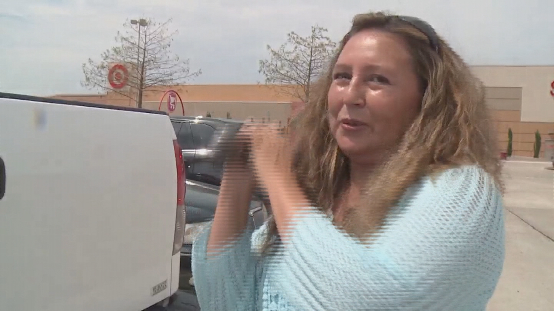 Woman breaks car window to rescue baby in hot car | khou.com