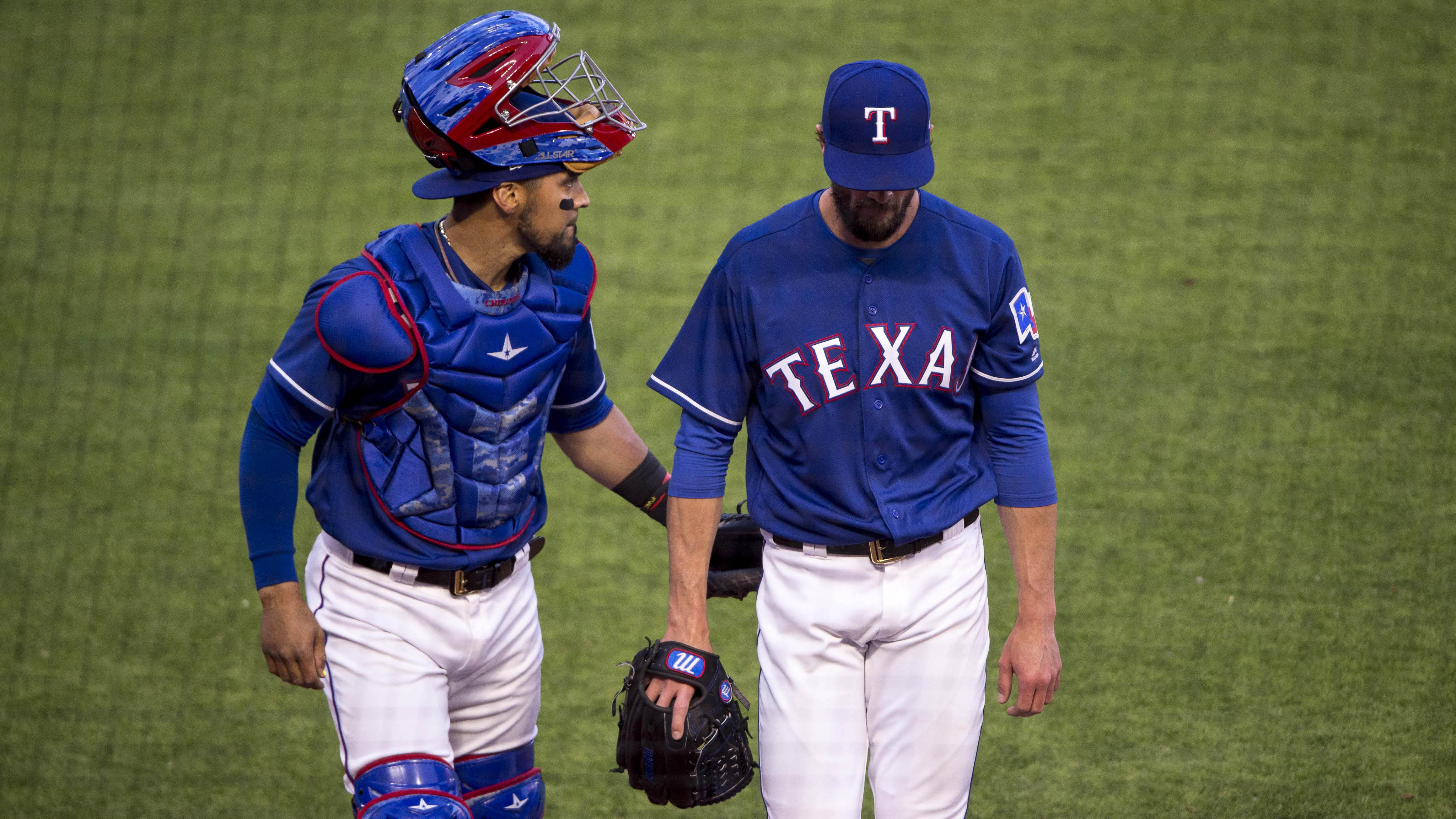 Rangers' Hamels to miss eight weeks with oblique injury