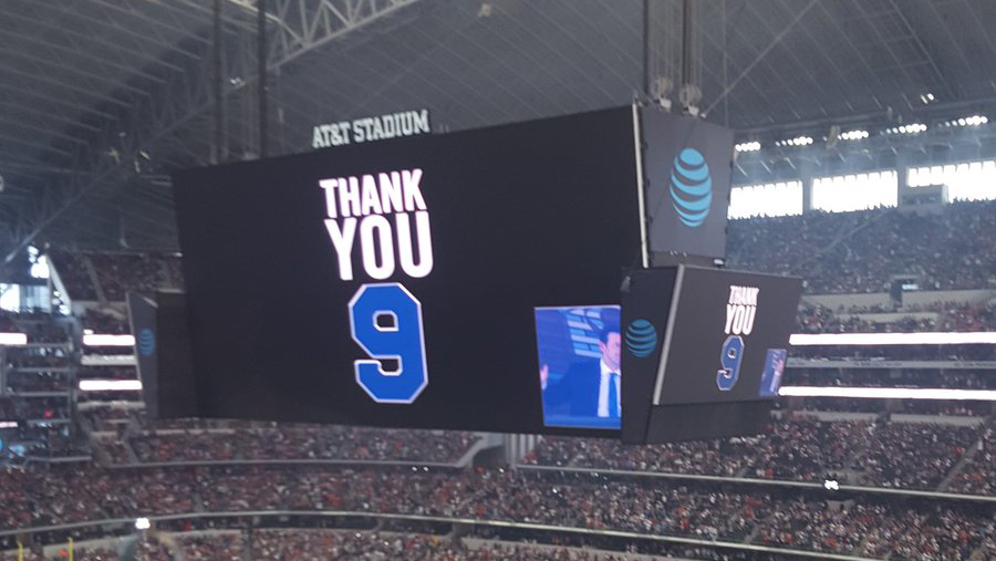 Dallas Cowboys quarterback Tony Romo (9) watches the scoreboard as